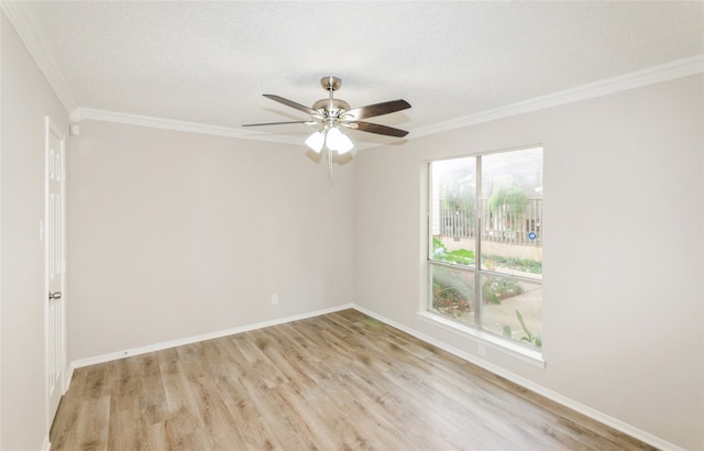 unfurnished room with ceiling fan, light wood-type flooring, ornamental molding, and a textured ceiling