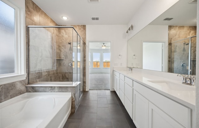 bathroom with vanity, separate shower and tub, ceiling fan, and tile patterned floors