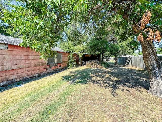 view of yard featuring fence