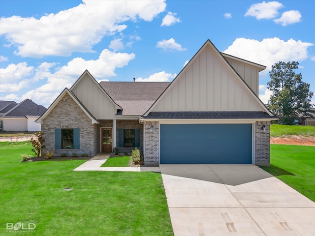 view of front of property featuring a front lawn and a garage