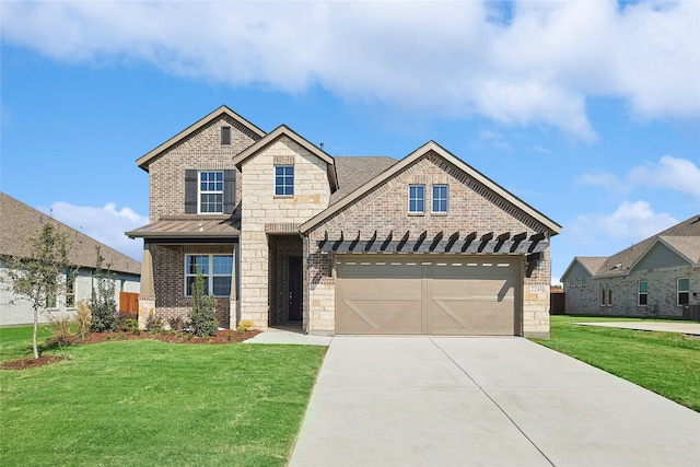 craftsman-style home featuring a front yard, a standing seam roof, brick siding, and concrete driveway