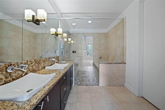 bathroom featuring a stall shower, a sink, and tile walls