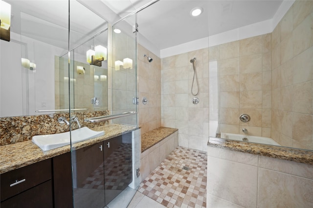 bathroom featuring tile walls and vanity