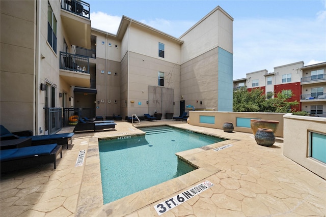 pool with a patio