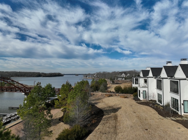 exterior space with a water view