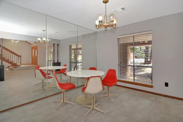 dining room with a chandelier