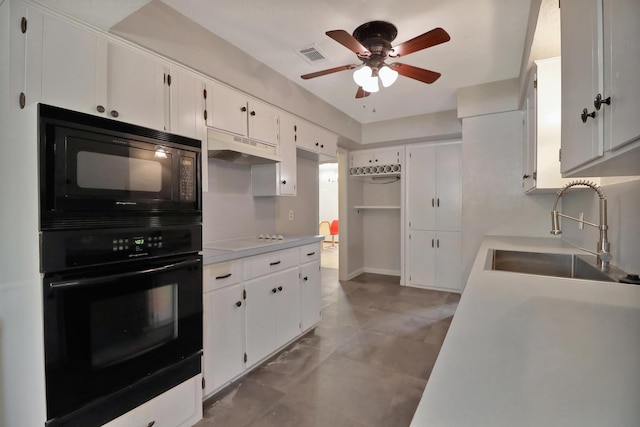 kitchen with white cabinetry, sink, black appliances, and ceiling fan