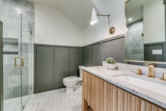 bathroom featuring an enclosed shower, tile patterned flooring, lofted ceiling, toilet, and vanity