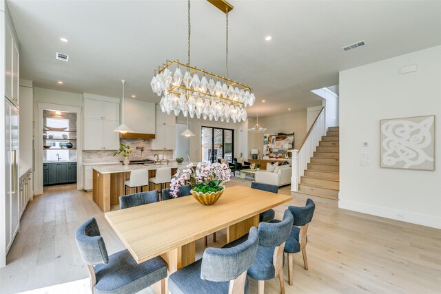 dining room featuring light hardwood / wood-style floors