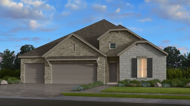 view of front of property with a garage