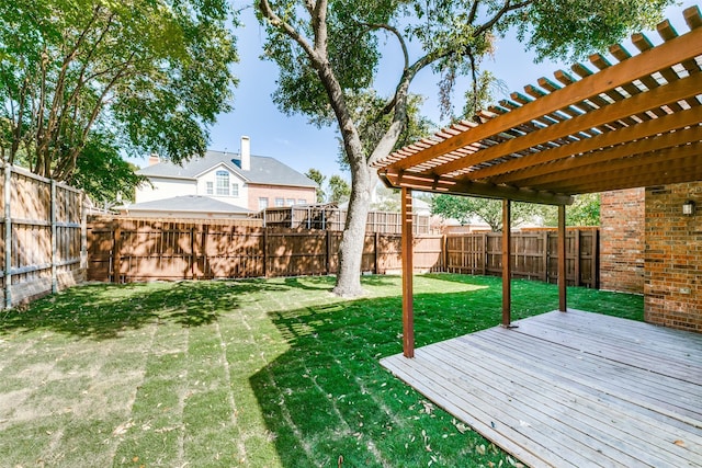 view of yard with a pergola and a deck