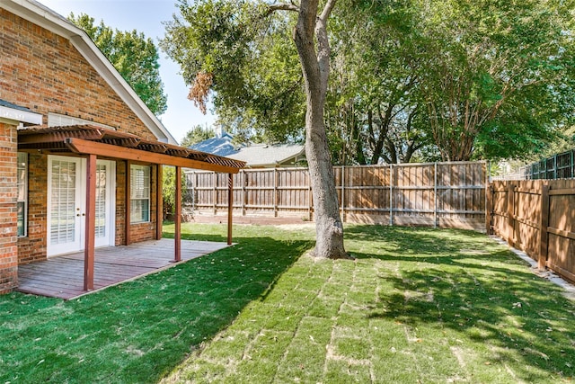 view of yard with a deck