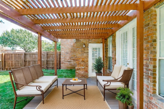 view of patio featuring an outdoor living space and a pergola