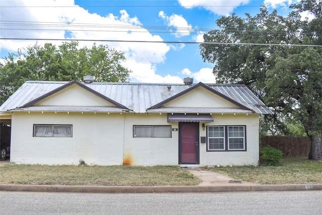 view of front of home with a front yard