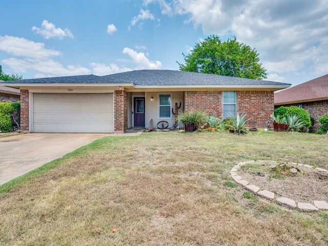 single story home with a garage and a front lawn