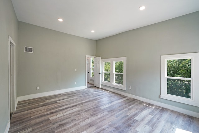 spare room featuring light wood-type flooring