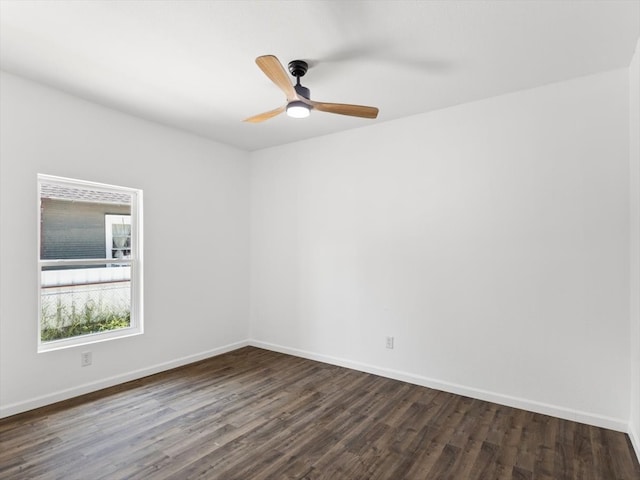 empty room featuring hardwood / wood-style flooring and ceiling fan