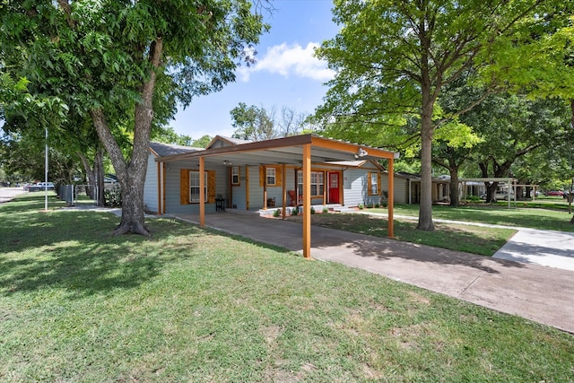 view of front of home with a front yard and covered porch