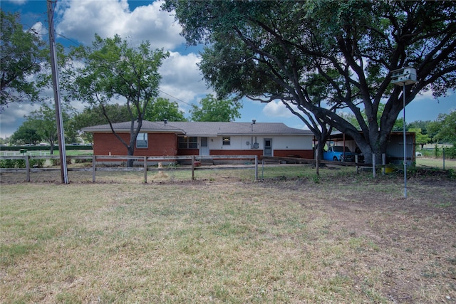 exterior space featuring a front lawn