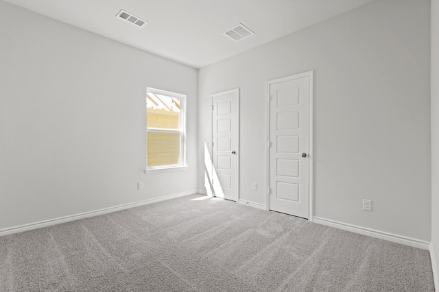 unfurnished bedroom with carpet flooring