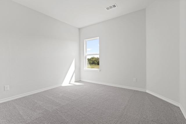 spare room with carpet flooring