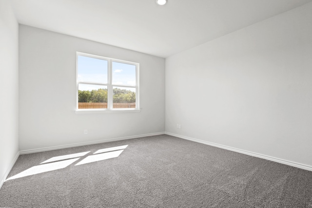 unfurnished room featuring carpet floors