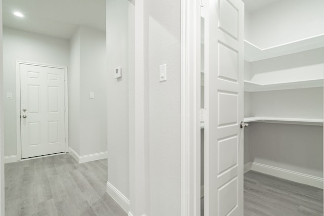 hallway featuring light hardwood / wood-style floors