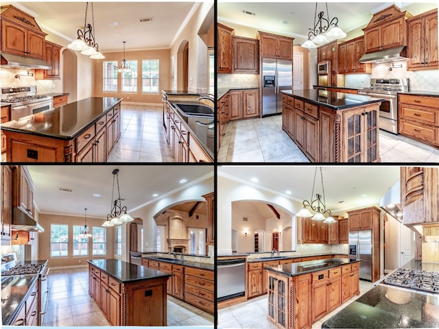 kitchen featuring a spacious island, a chandelier, stainless steel appliances, and under cabinet range hood