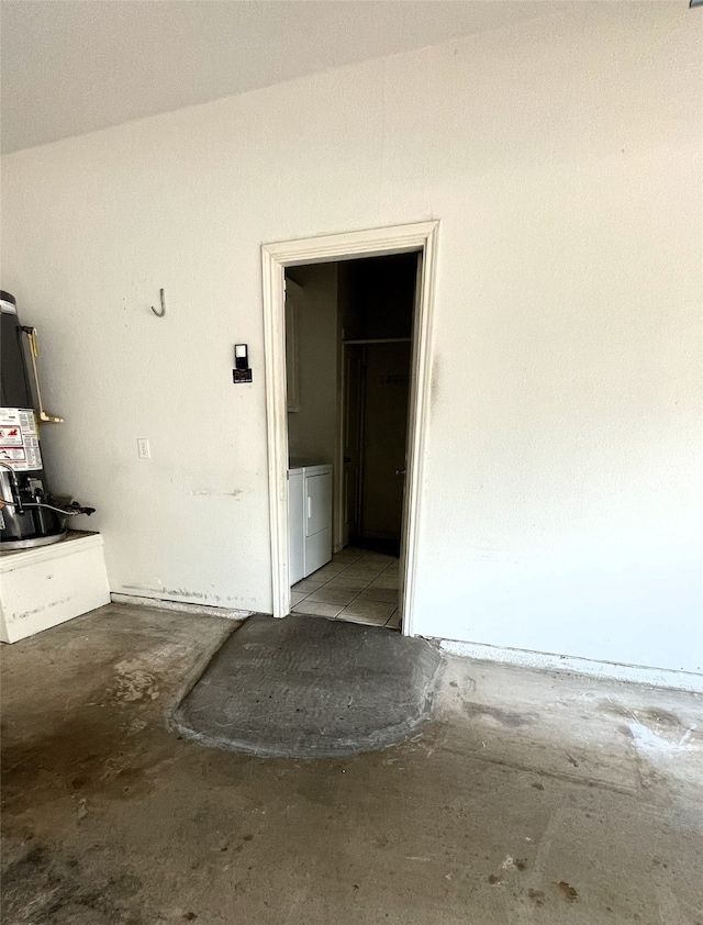 garage featuring washer and clothes dryer