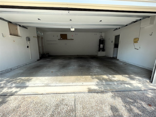 garage featuring gas water heater