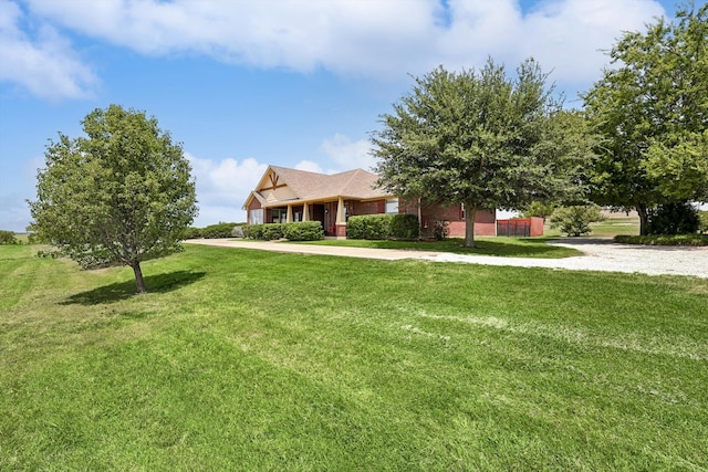 view of front of home featuring a front yard