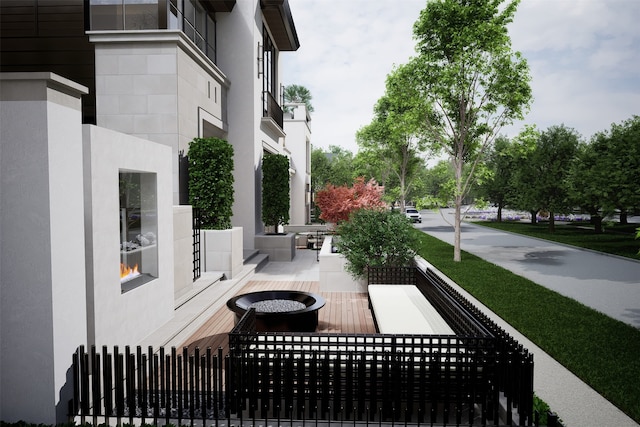 view of patio / terrace with an outdoor fire pit