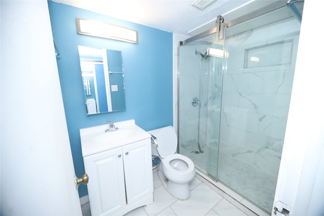 bathroom with tile patterned flooring, a shower with shower door, toilet, and vanity