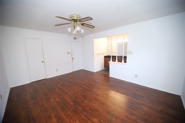 spare room with wood-type flooring and ceiling fan