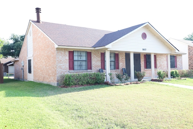 single story home with a porch and a front lawn