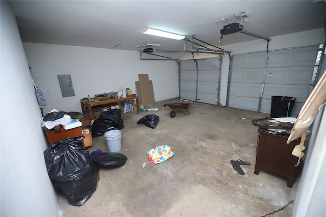 garage featuring a garage door opener and electric panel