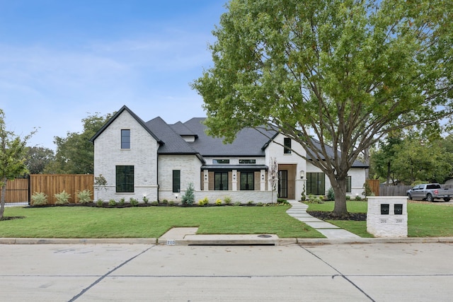 view of front facade with a front lawn