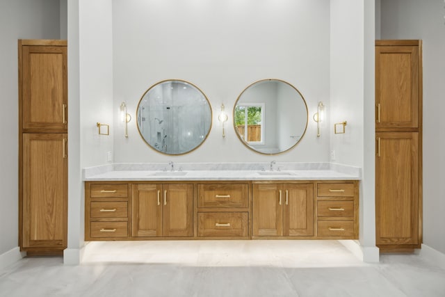 bathroom featuring vanity and a shower with shower door