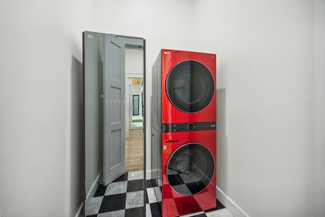 washroom with stacked washer and dryer