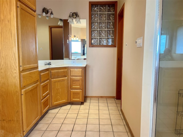 bathroom featuring tile patterned floors and vanity