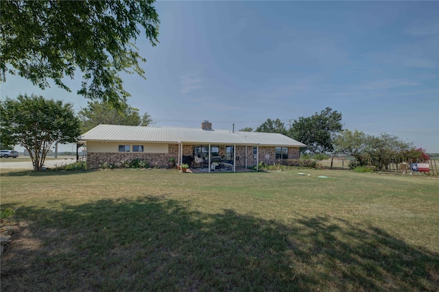 exterior space with a front lawn