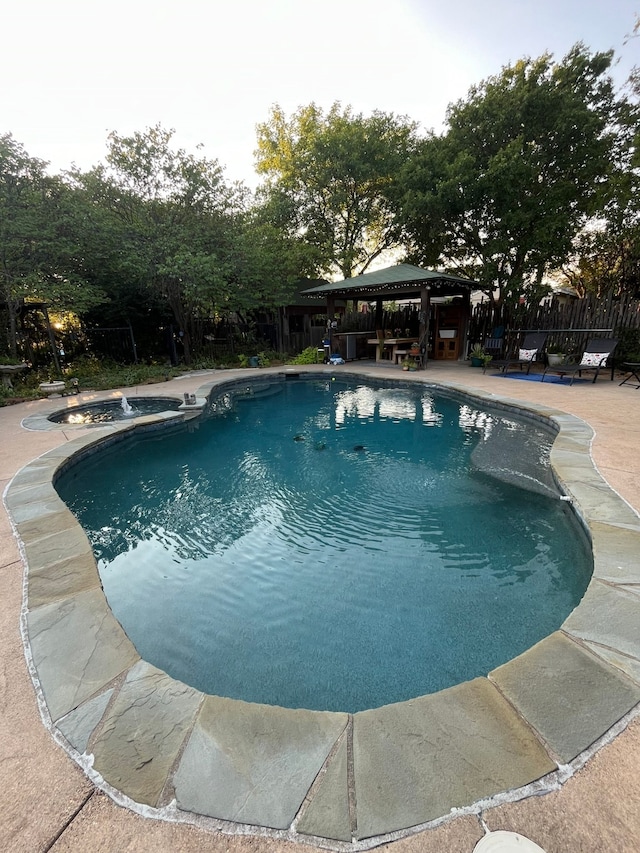 view of pool with a gazebo and a patio area