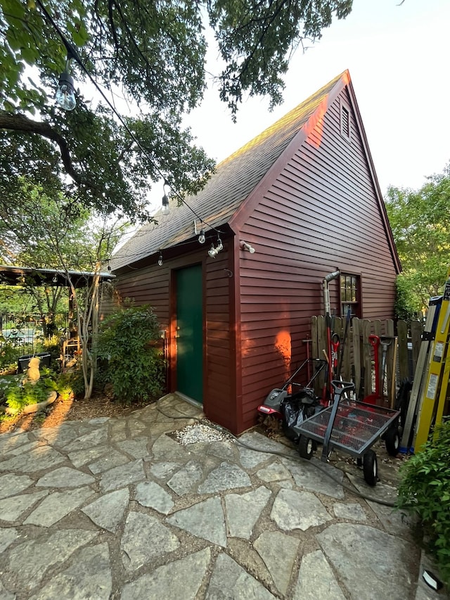 view of side of home featuring a patio