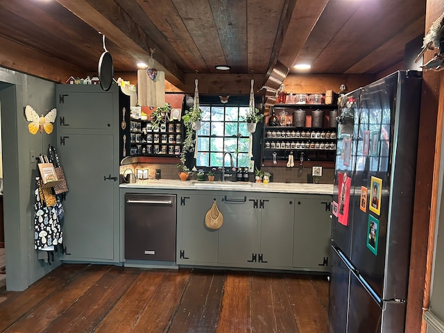 bar with sink, black refrigerator, tasteful backsplash, dark hardwood / wood-style flooring, and wooden ceiling