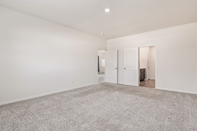 unfurnished bedroom with carpet flooring