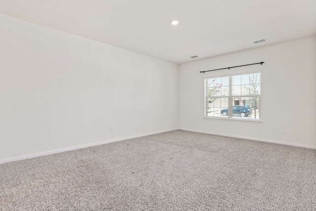 view of carpeted spare room