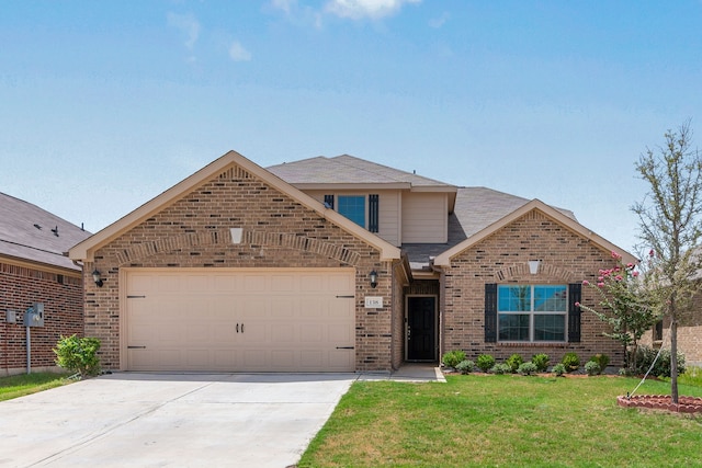 view of front facade featuring a garage and a front lawn