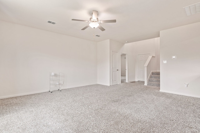 empty room featuring carpet and ceiling fan