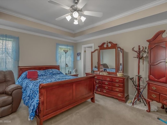 bedroom with light colored carpet, crown molding, and ceiling fan