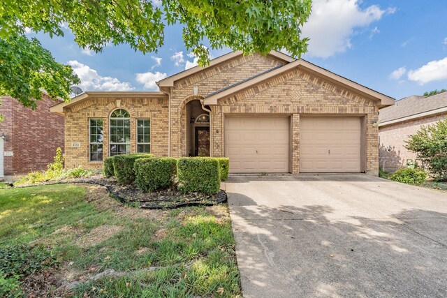 ranch-style house with a garage